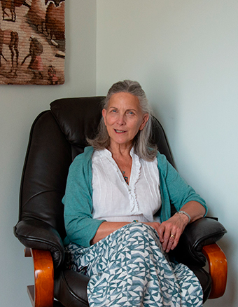 Esther Dawney-New seated in the counselling room